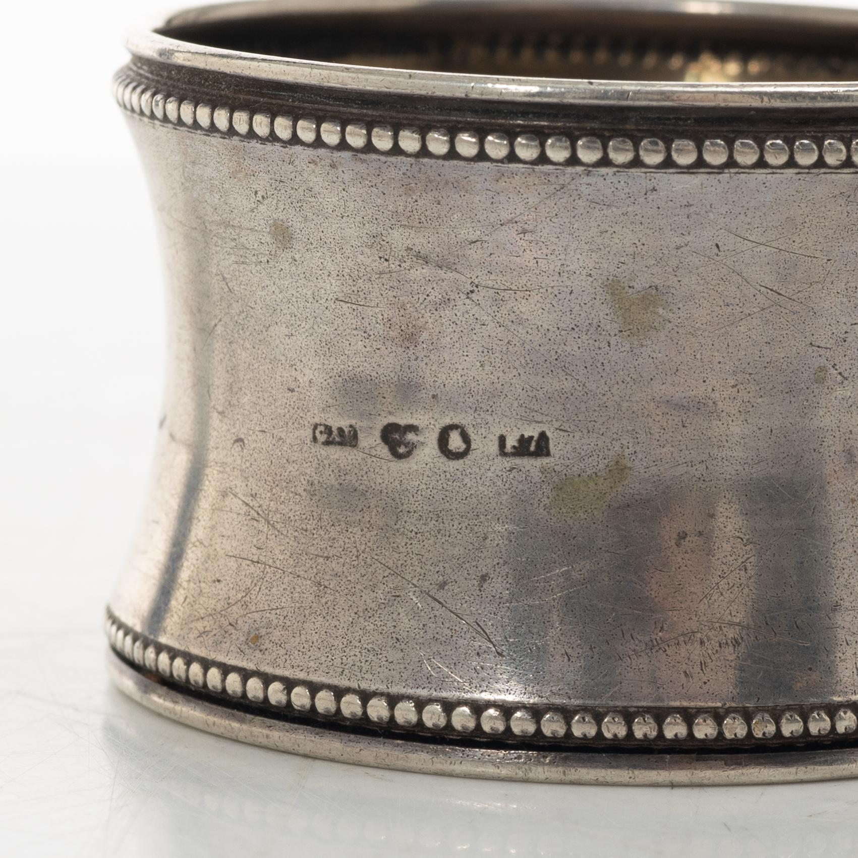 Brödkorgar, 2 st, samt servettringar, 3 st, silver, 1800-1900-tal.