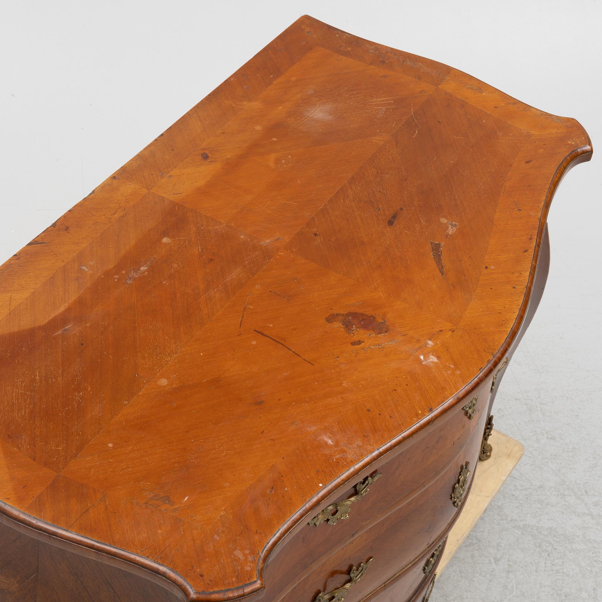 A Rococo chest of drawers, 18th Century.