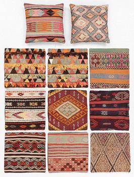 Nine Kilim pillow cases and two Kilim pillows, around 1970, ca. 50 x 50 cm.