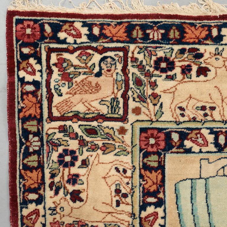 A rug, an antique Kerman Laver figural, ca 204-205 x 138,5-139 cm (as well as ca 0,5 cm flat weave at the the ends).