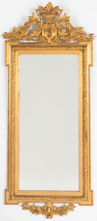 A Gustavian style mirror, around 1900.