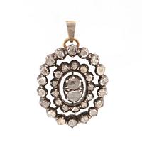 Pendant of gold and silver with rose-cut diamonds.