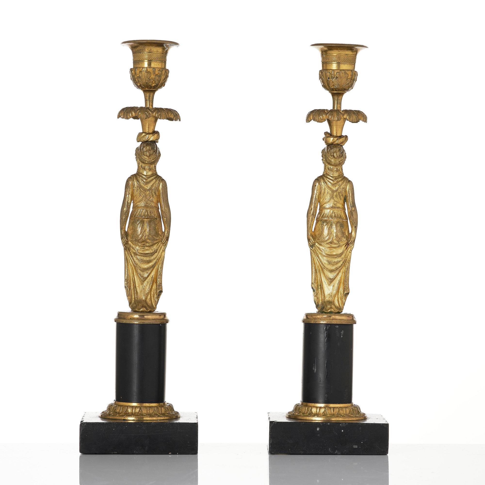 A pair of late Gustavian marble and ormolu candlesticks attributed to F. L. Rung (1758-1837).