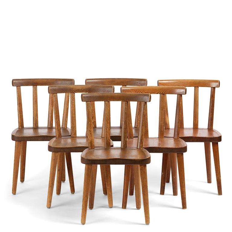 Axel Einar Hjorth, a set of six stained pine "Utö" chairs, Nordiska Kompaniet, Sweden, 1930s.