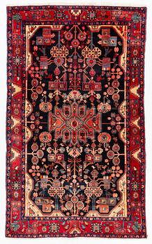 A oriental rug, c. 245 x 150 cm.