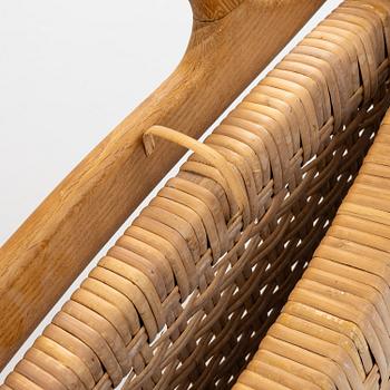 Hans J. Wegner, A folding chair, JH 512, Johannes Hansen, Denmark.