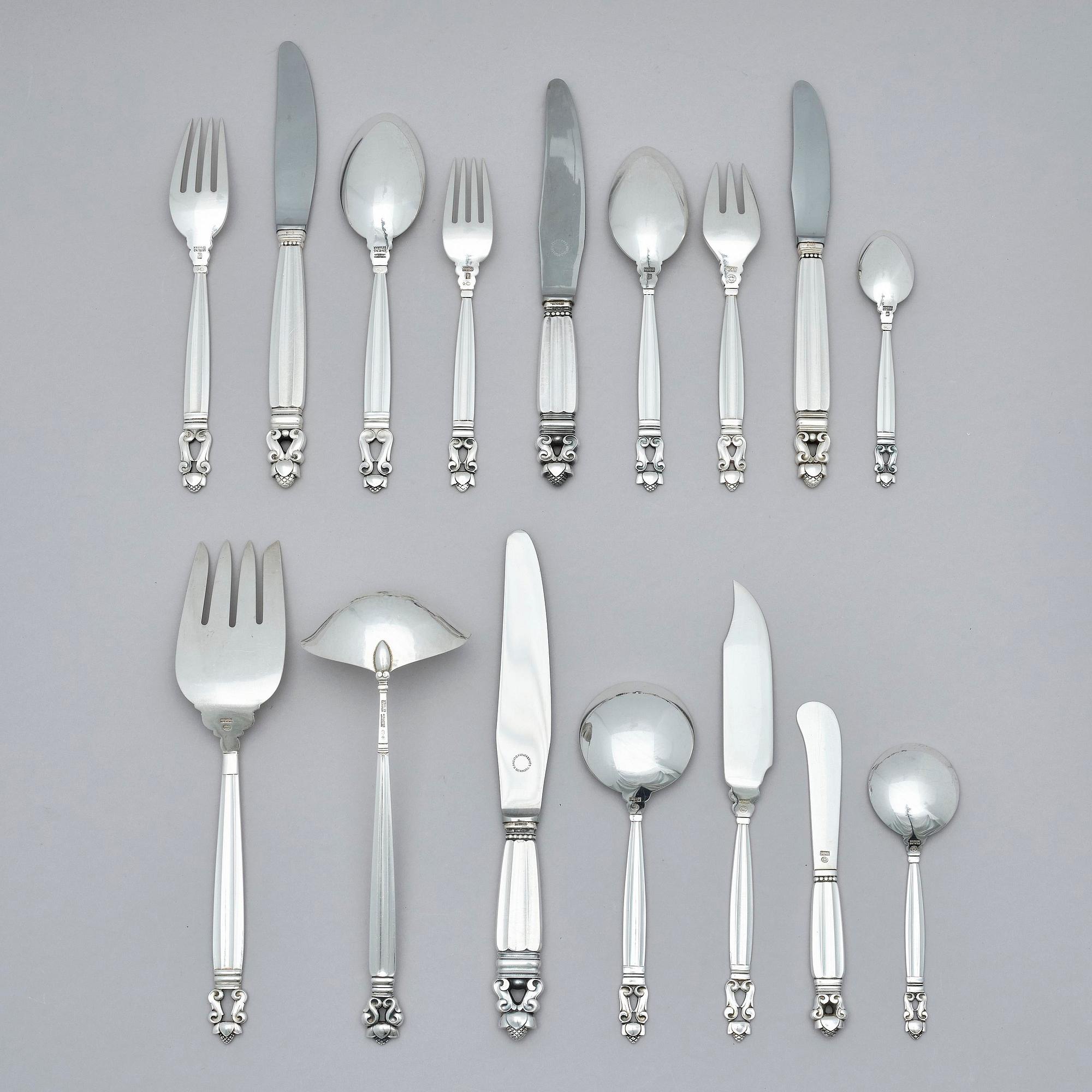 Georg Jensen, a set of 139 pieces of  'Acorn' sterling silver and stainless steel flatware, design Johan Rohde, Copenhagen after 1945.