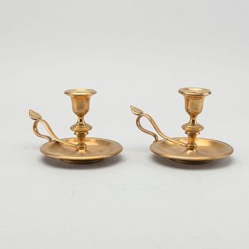 A pair of Gusum brass candelsticks.