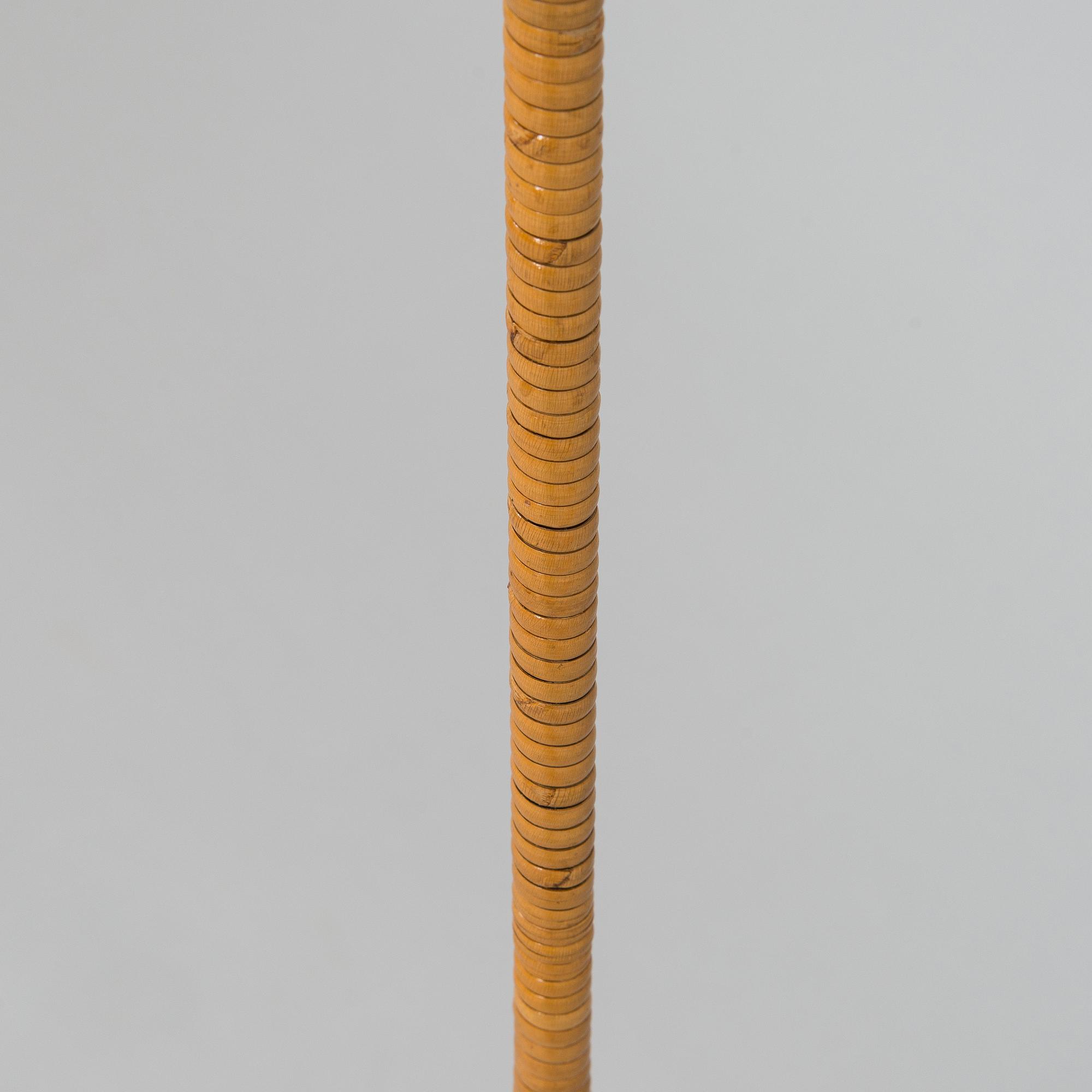 Paavo Tynell, a mid-20th century K10-10 floor lamp for Idman.