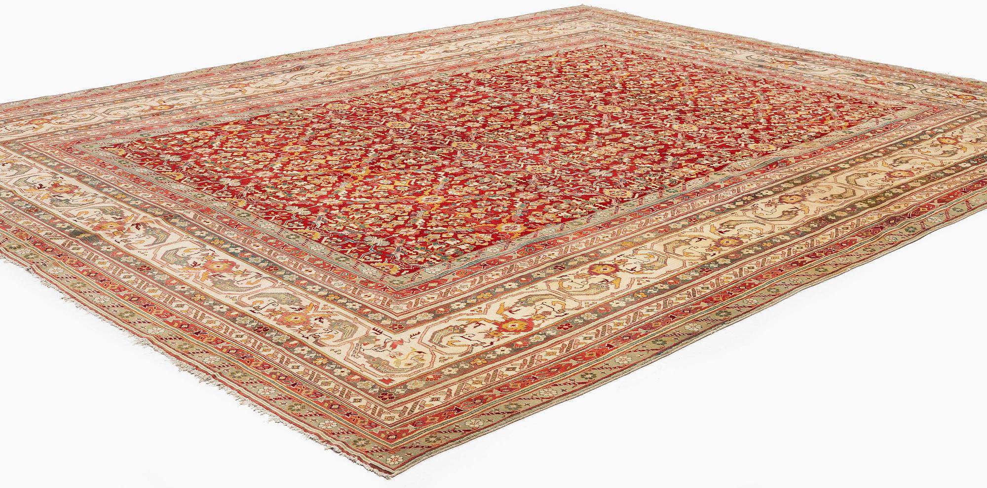 An antique Agra carpet, North India, c. 470 x 370 cm.