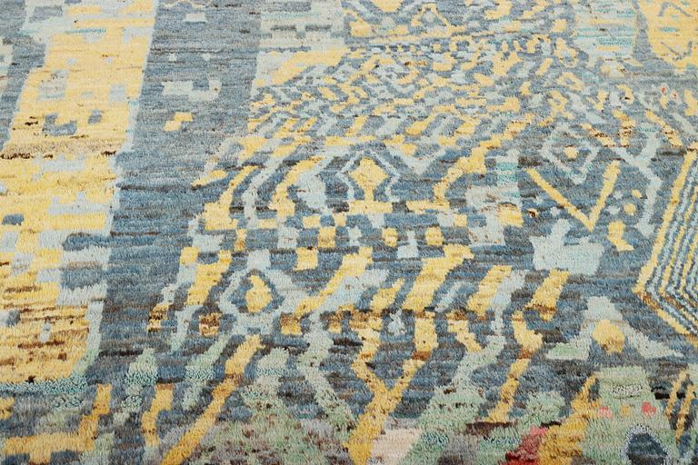 A Moroccan carpet with modern design, c. 298 x 203 cm.