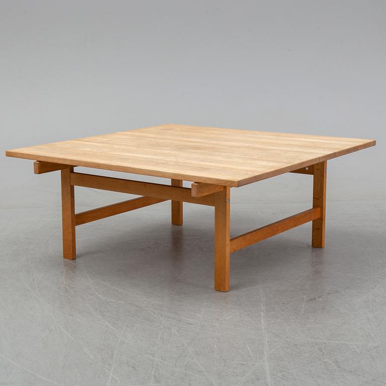 An oak coffee table by Hans J Wegner for Andreas Tuck, Denmark.