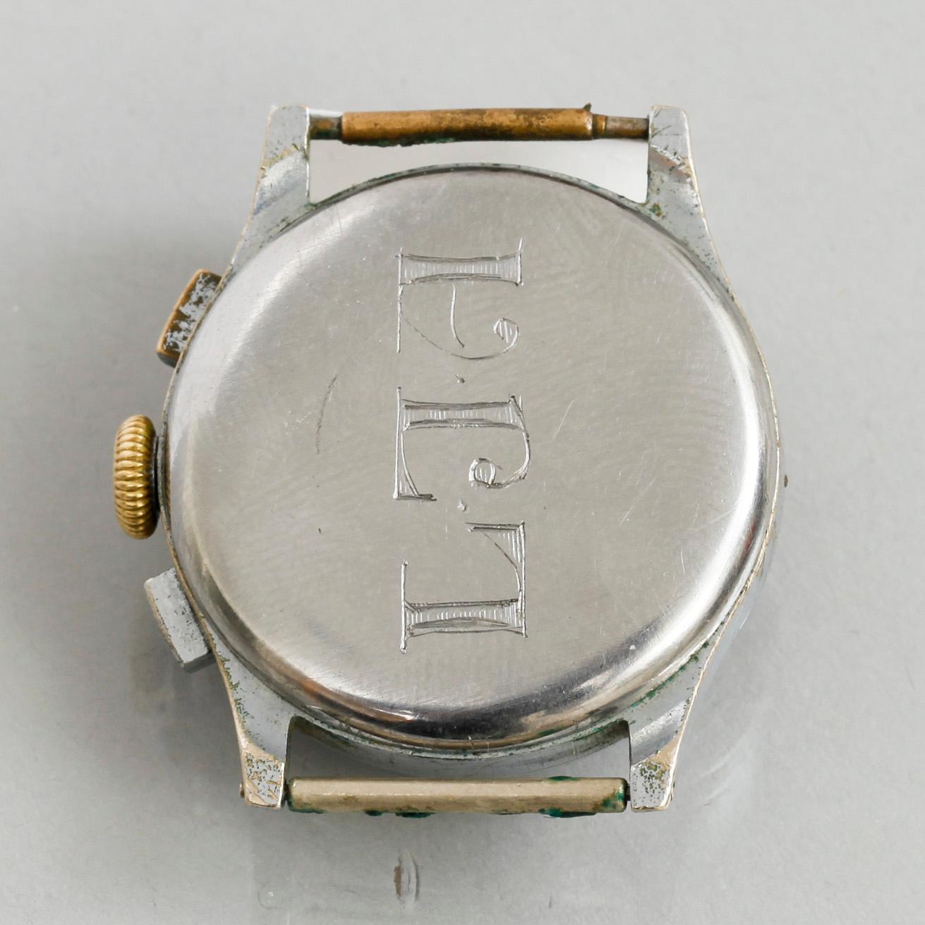 HERRARMBANDSUR, Heuer, stål, Kronograf. 1940-tal.