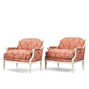 A pair of Louis XVI late 18th Century armchairs by M. dela Porte (Paris 1765-1784).