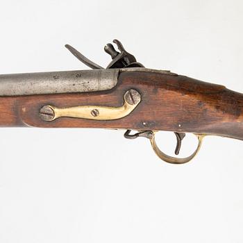 A British flintlock gun, 18th century.