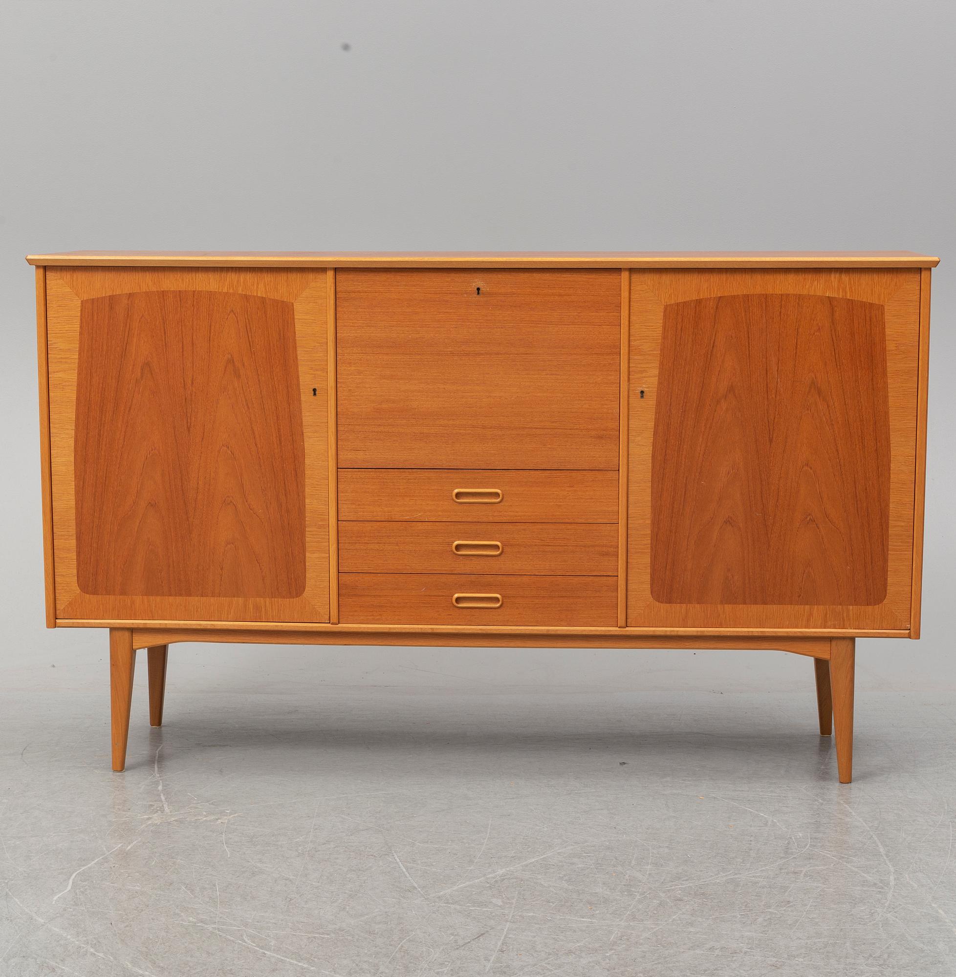 A mid 20th Century teak sideboard.