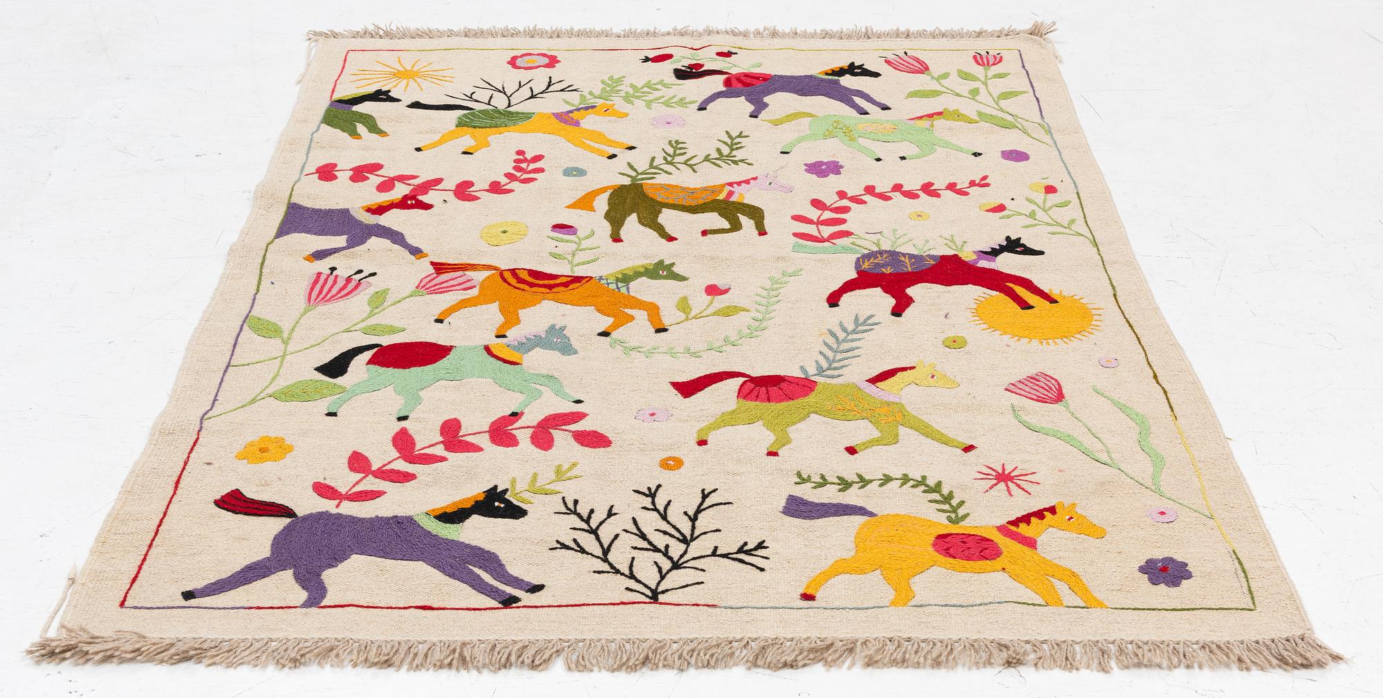 A hand-embroidered Kelim carpet, c. 208 x 150 cm.