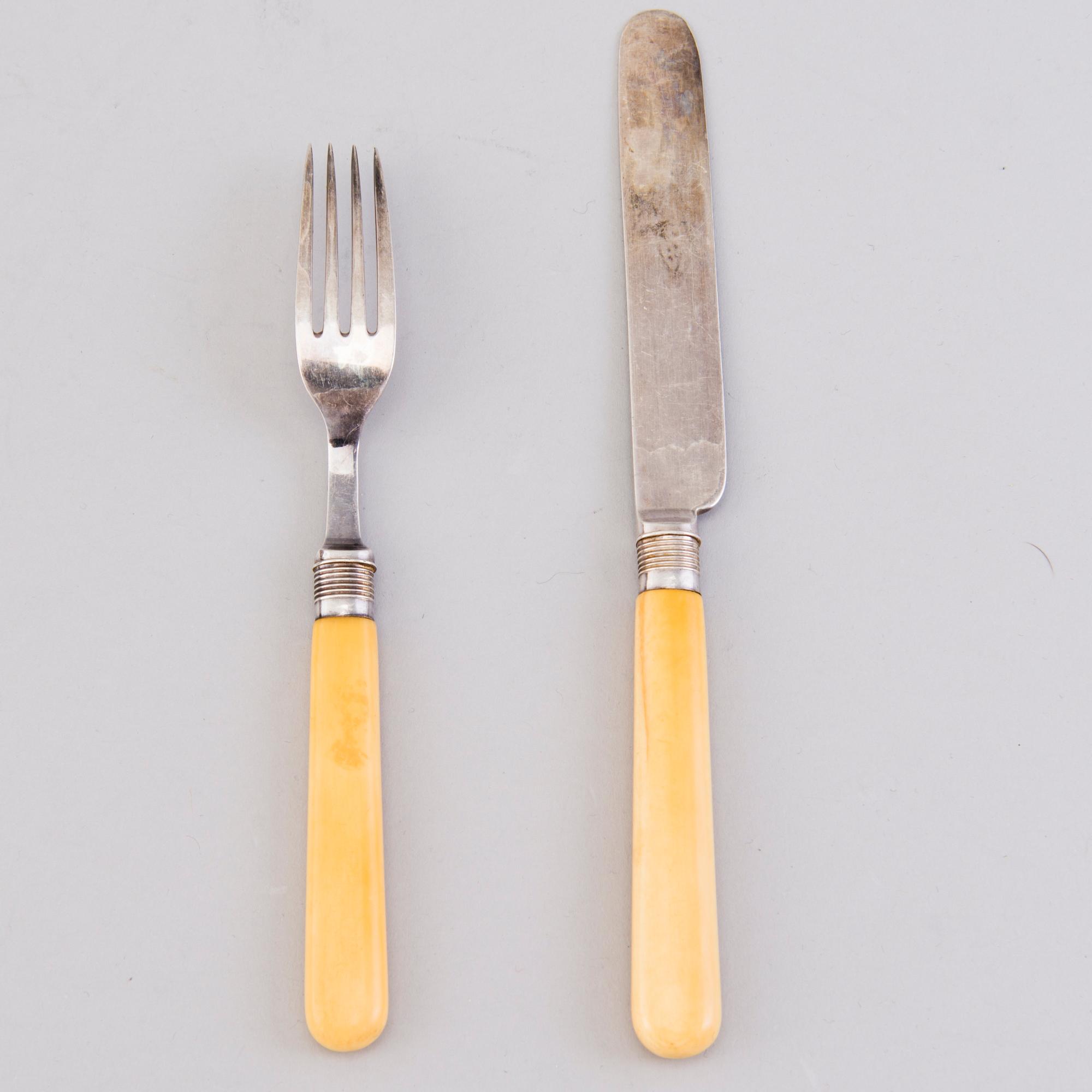CUTLERY, 12+12, silver with bone handles, Sheffield 1894.
