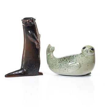 Lisa Larson, a 'Pilgrimsfalk' and 'Bison' figurine, Gustavsberg for NK, Nordiska Kompaniet in collaboration with WWF.
