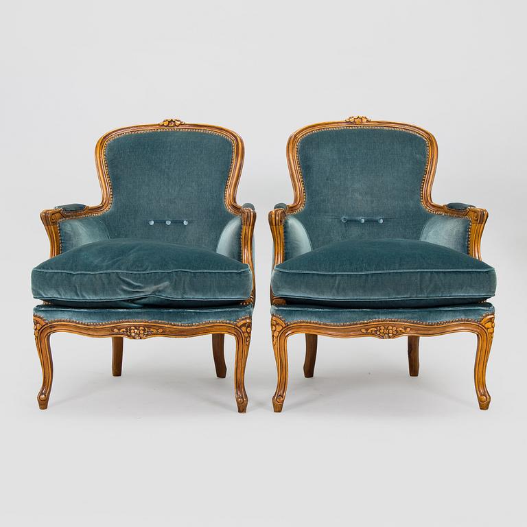A pair of Louis XV style armchairs, mid-20th century.