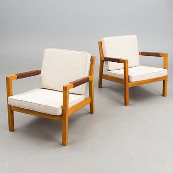 A pair of Mid-Century Rialto Armchairs, manufacturer Puunveisto Oy - Träsnideri Ab, Finland.