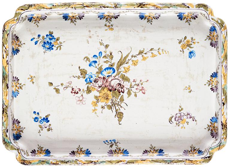 A Swedish Rococo faience tea table, dated 1774.