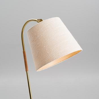 PAAVO TYNELL, A FLOOR LAMP.Manufactured by Idman. 1950s.