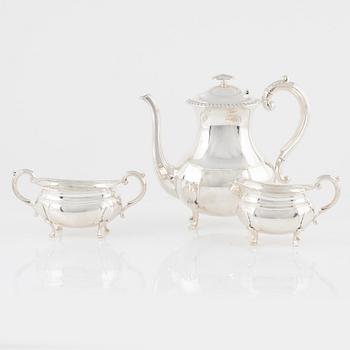 A Norwegian Silver Coffee Pot, Creamer and Sugar Bowl, mark of David Andersen, Oslo, mid-20th Century.