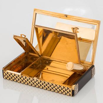 Cartier Art Deco Vanity Case 18K guld med svart emalj och baguette- och rosenslipade diamanter.