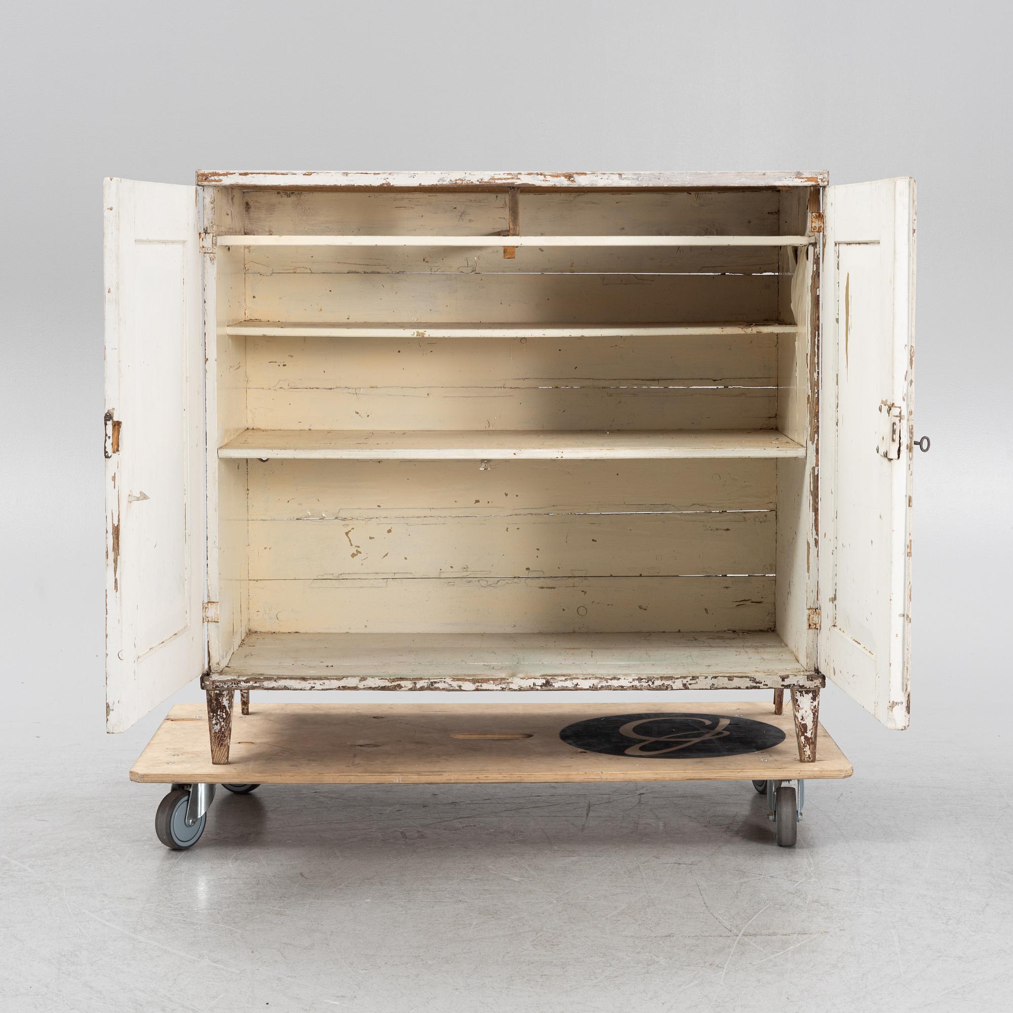 A painted cabinet from arond the year 1900.