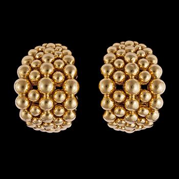 1024. A pair of Boucheron gold earclips.
