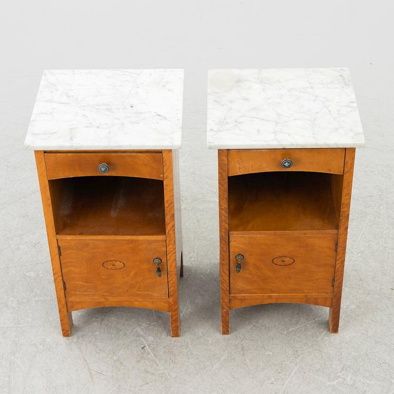 A pair of early 20th century bedside tables.
