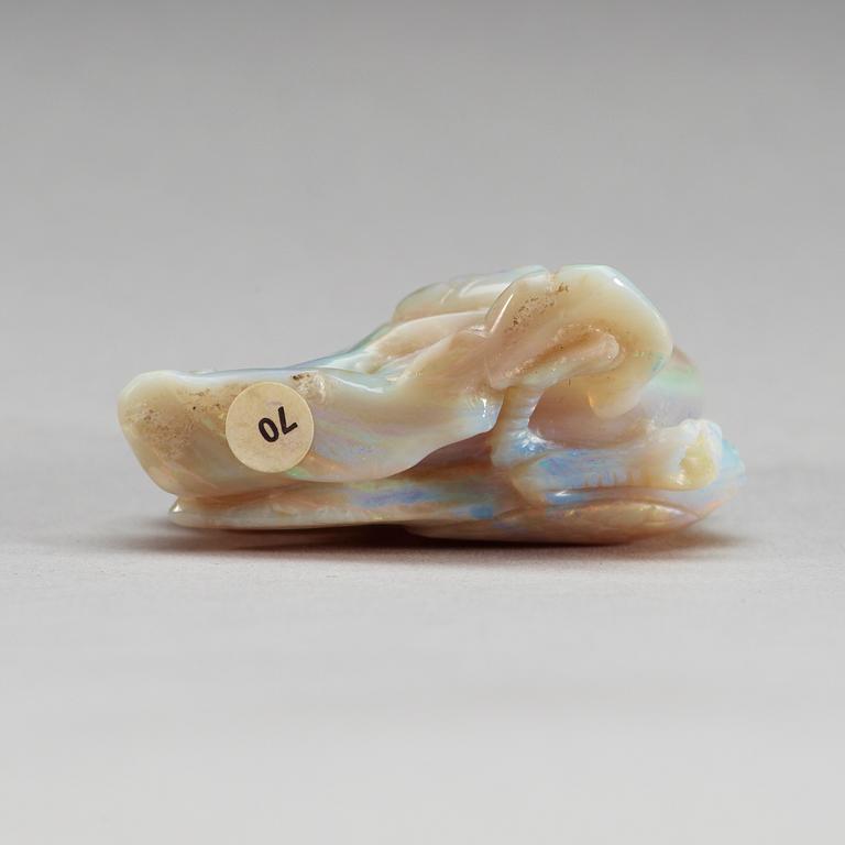 A carved snuff bottle, presumably opal.