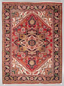 A semi-antique carpet from Eastern Europe, around 335 x 244 cm.
