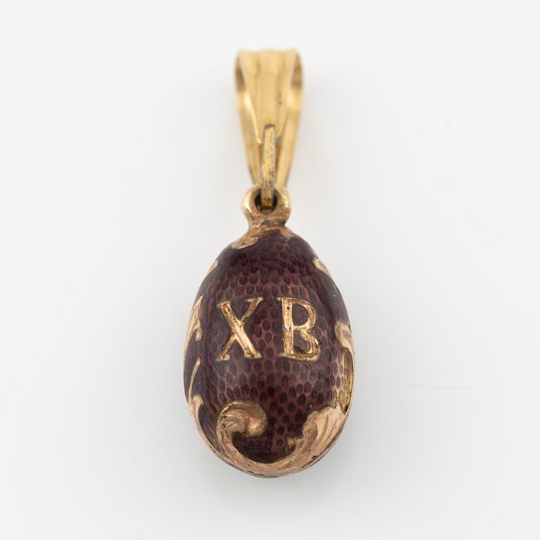 Pendant, egg, gold and purple enamel.