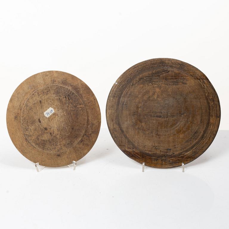 Twelve wooden plates, 19th Century.