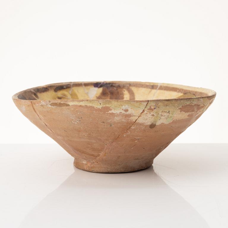 A glazed earthenware bowl, possibly Hispano-Moresque.