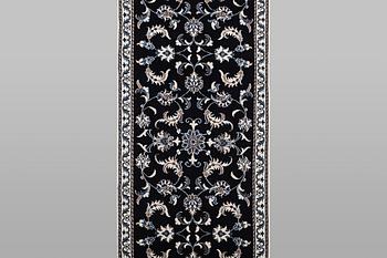 A runner carpet, Nain, part silk, ca 293 x 77 cm.