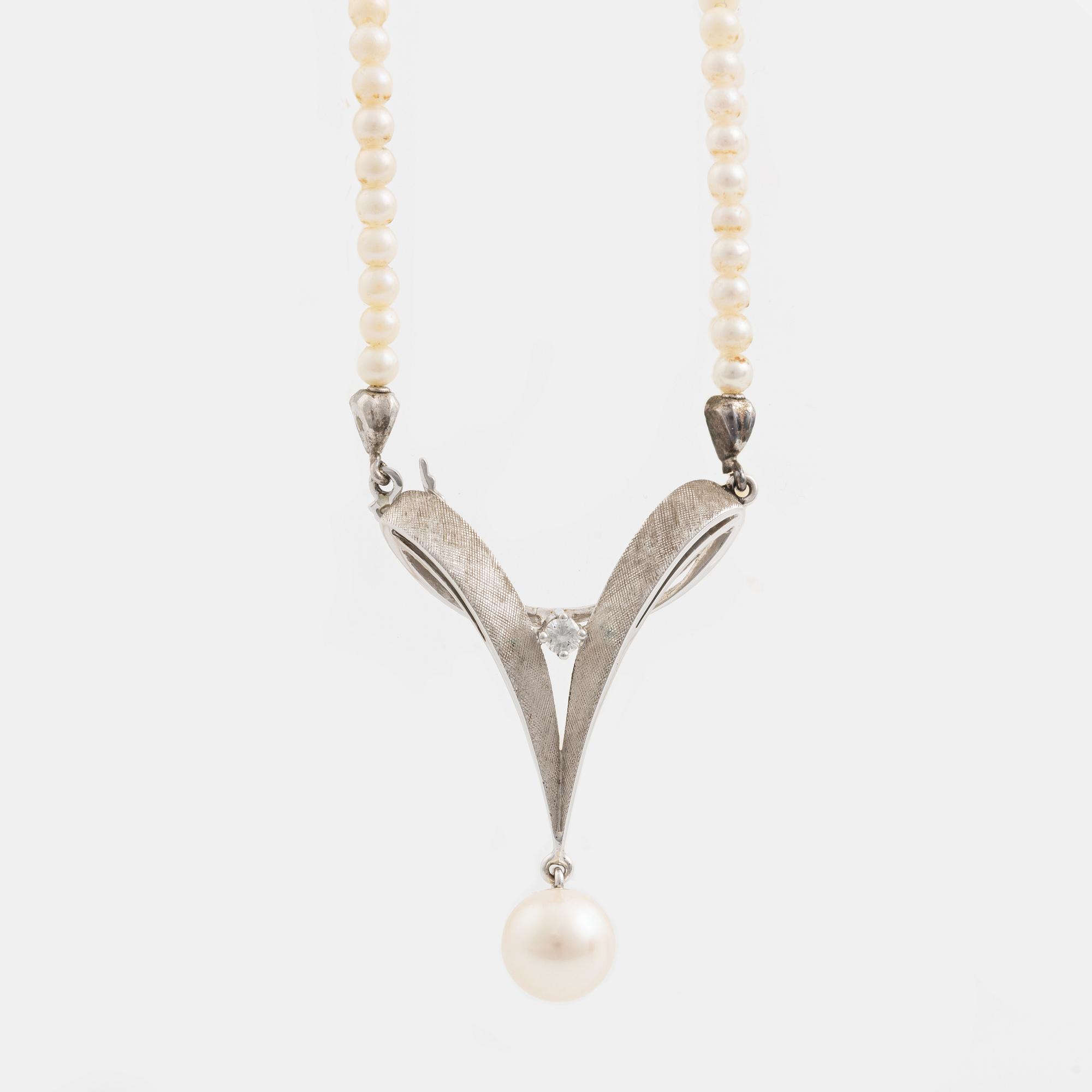 Necklace and earrings, a pair, cultured pearls, white gold, and brilliant- and octagon-cut diamonds.