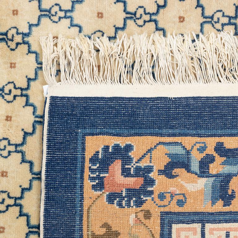 A carpet, China, antique finish, ca 275 x 185 cm.