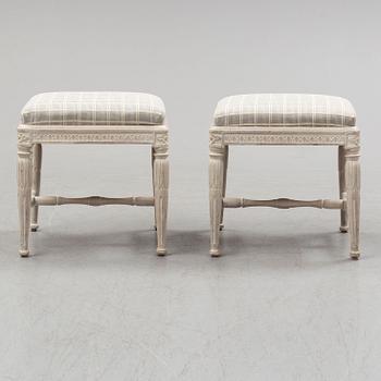 A pair of gustavian late 18th century stools by Erik Öhrmark (master in Stockholm 1777-1813).