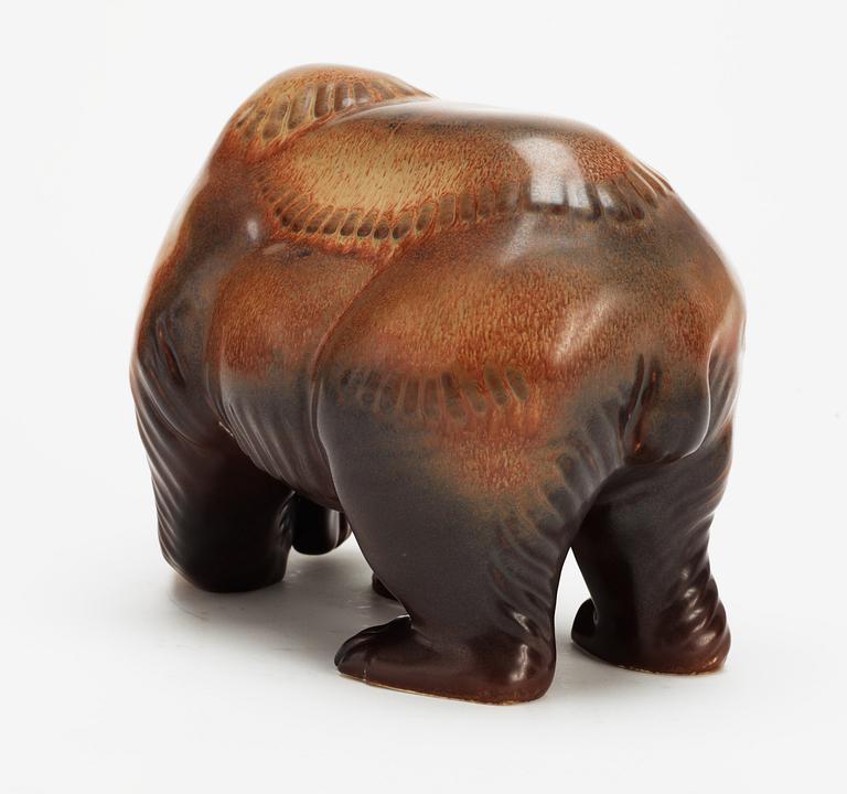 A Gunnar Nylund stoneware figure of a bear, Rörstrand.