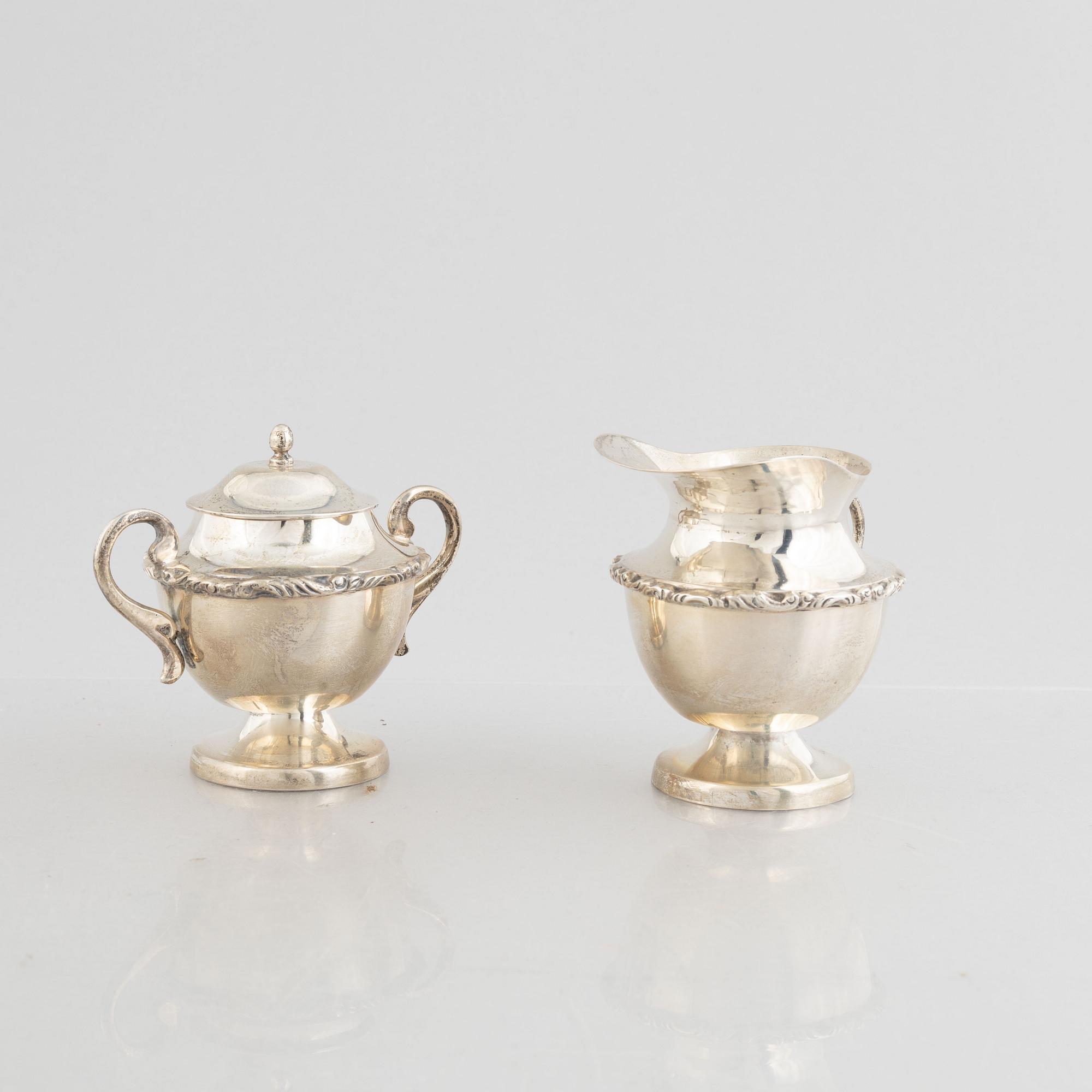 Juveto Lopex Reyes, a sterling silver sugar bowl, creamer and tray, Mexico City, Mexico, mid20th century.