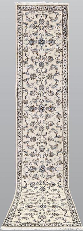 A Nain runner, part silk, c. 394 x 75 cm.