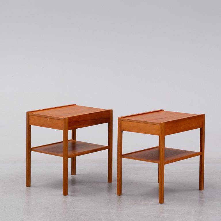 A pair of teak bedside tables, second half of the 20th Century.