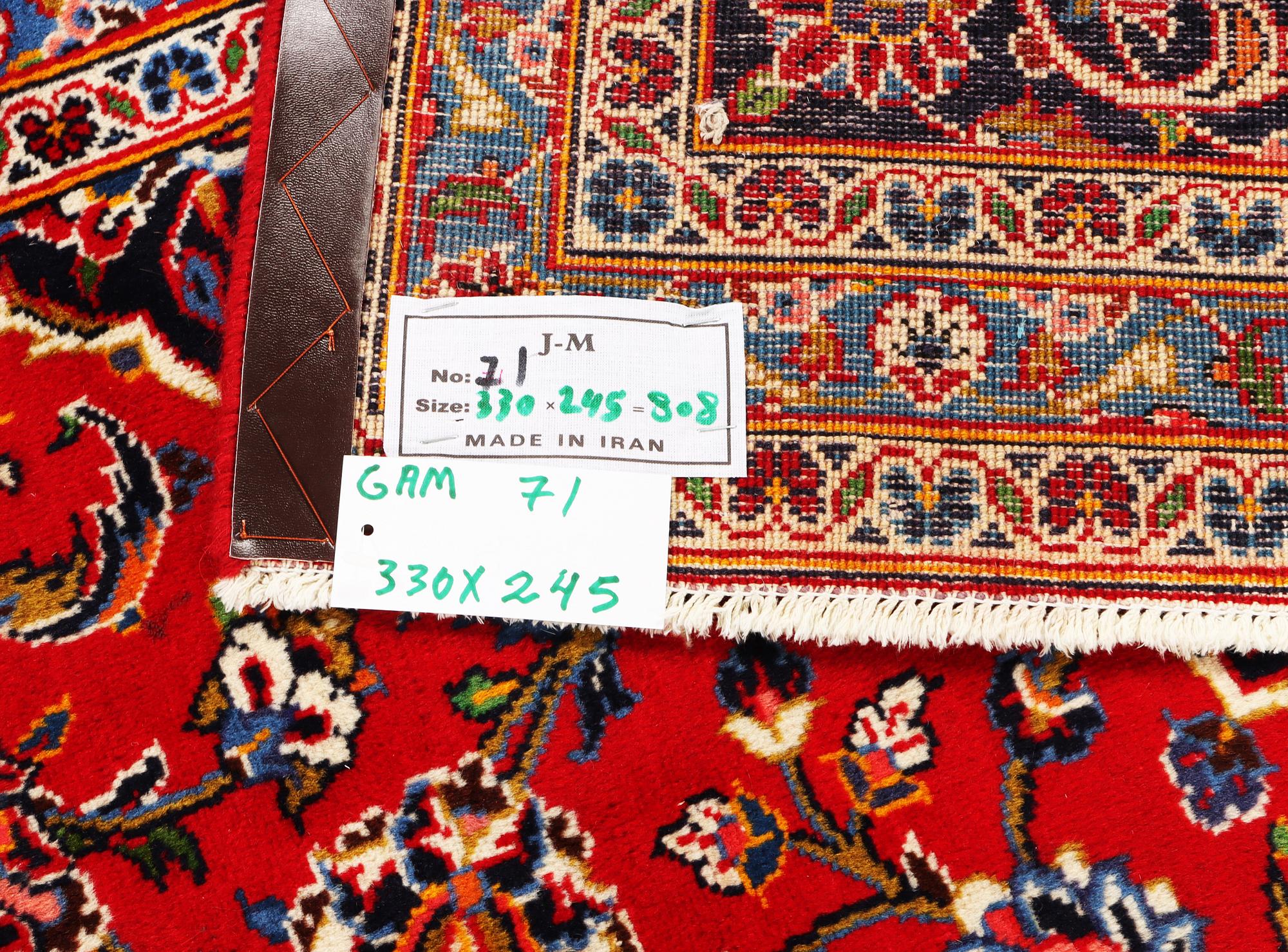 A Keshan carpet, c. 330 x 245 cm.