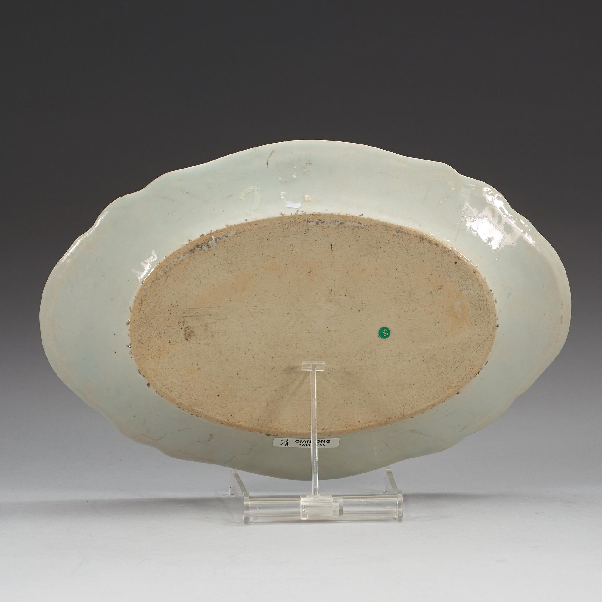 A famille rose 'double peacock' serving dish, Qing dynasty, Qianlong (1736-95).