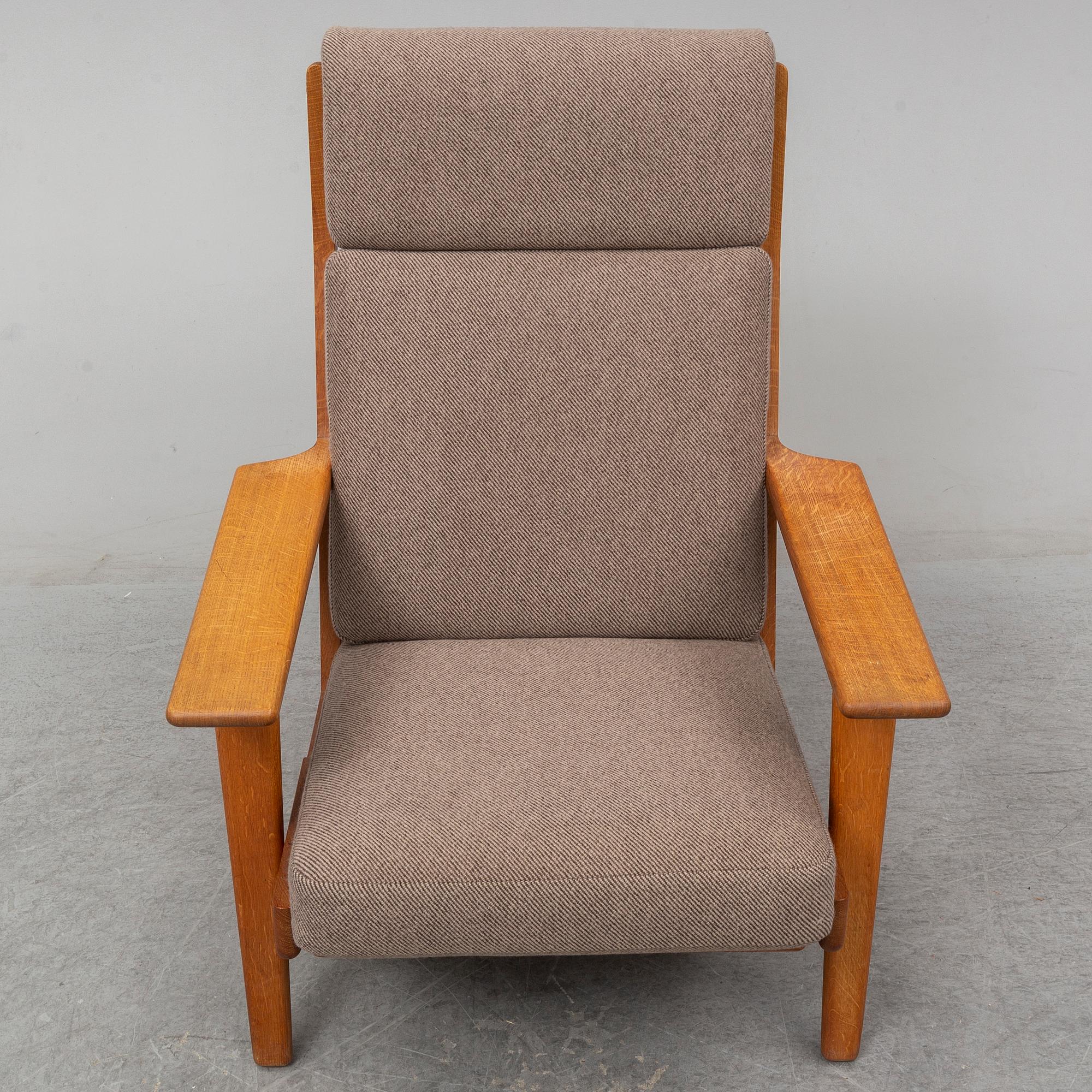 HANS J WEGNER, an oak 'GE-290' easy chair from Getama, Denmark.