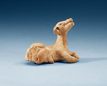 A potted figure of a dog, Six dynsties (222-589).