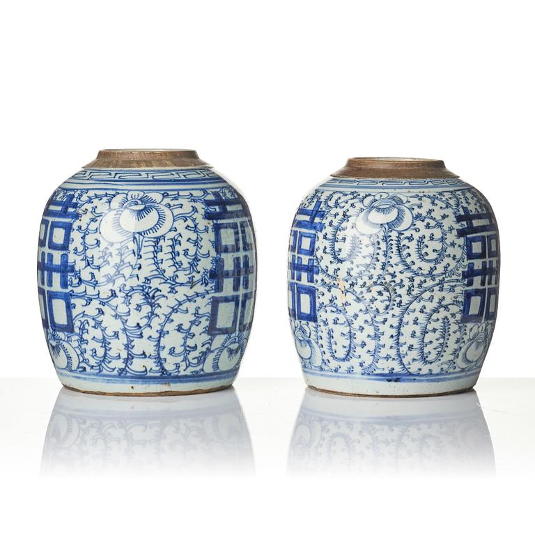 A pair of blue and white porcelain pots with covers, China, 19th century.